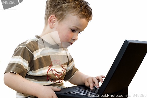 Image of Boy working on a laptop