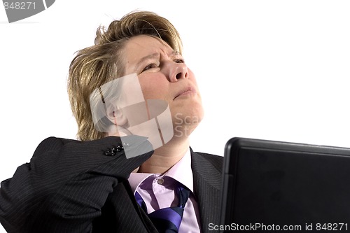 Image of Business woman having neck trouble