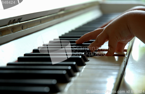 Image of Child playing the piano