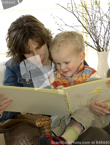 Image of Mother and son reading