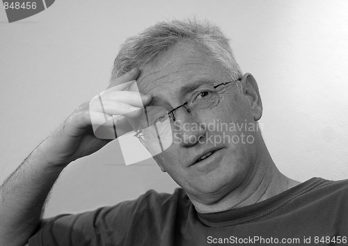 Image of Senior man thinking