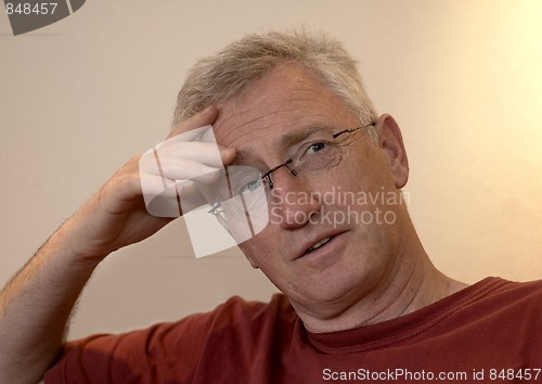 Image of Senior man thinking