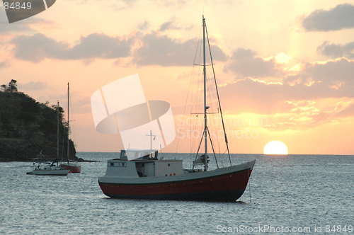 Image of sunset with sailboat