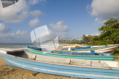 Image of native fishing boats  desolate beach long bag corn island nicara