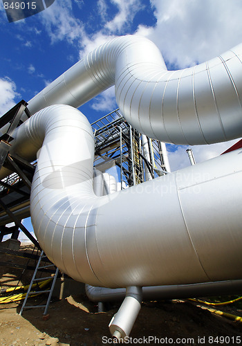 Image of Pipes, tubes, cables and equipment at a power plant