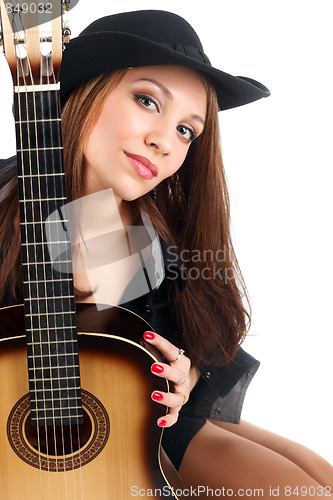 Image of Woman with guitar.