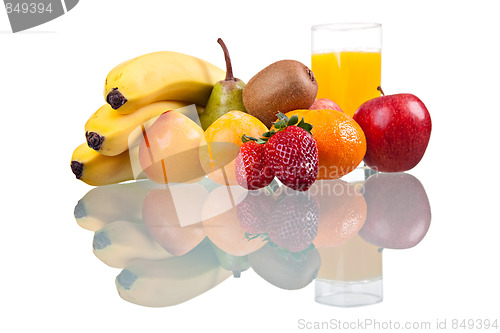 Image of fruit combined with a glass of juice  