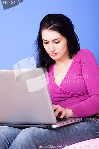 Image of pretty woman on the computer