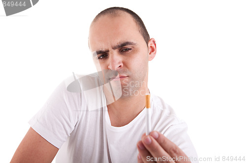 Image of man torn between smoking and not smoking