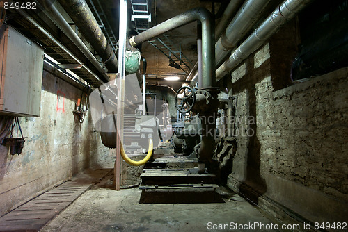 Image of Pipes, tubes, cables and equipment at a power plant