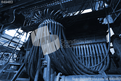 Image of Pipes, tubes, cables and equipment at a power plant