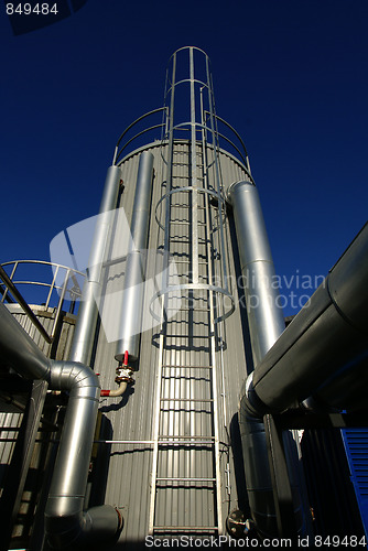 Image of Pipes, tubes, cables and equipment at a power plant