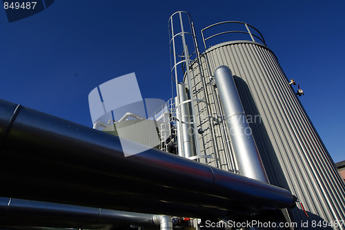 Image of Pipes, tubes, cables and equipment at a power plant