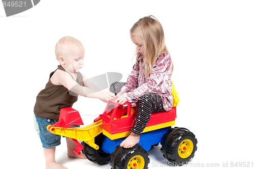 Image of Little boy and girl in studio