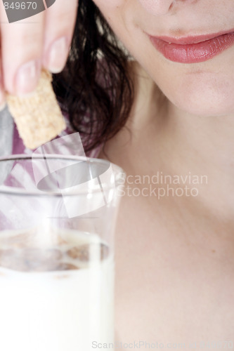 Image of Young people eating milk with cereals