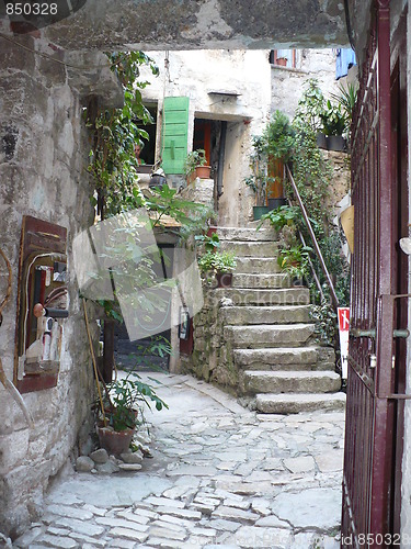 Image of Croatia. Istria. Rovinj. Picturesque courtyard behind a gate  