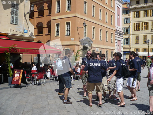 Image of France. French Riviera. Nice. American tourists dance on the square  