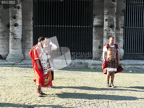 Image of Italy. Rome. Roman legionaries near to the Collosseum  