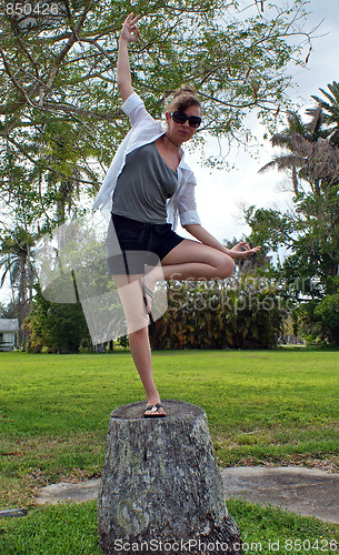 Image of Candid yoga tree pose