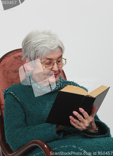 Image of Old woman reading