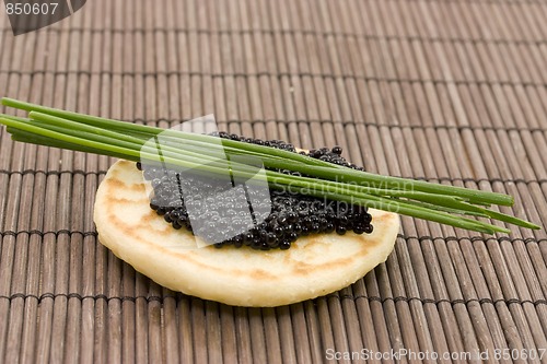 Image of caviar on pancake