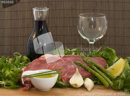 Image of Beef and salad with wine