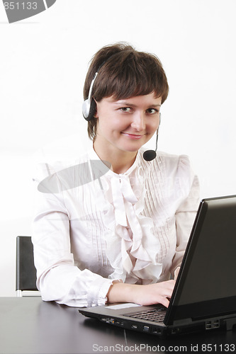 Image of Smiling businesswoman with headset