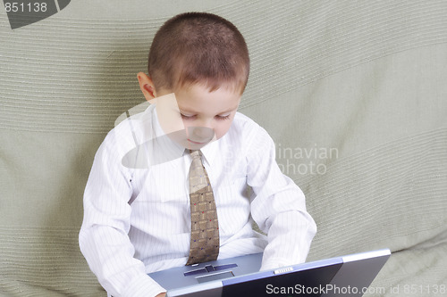 Image of Little boy with laptop