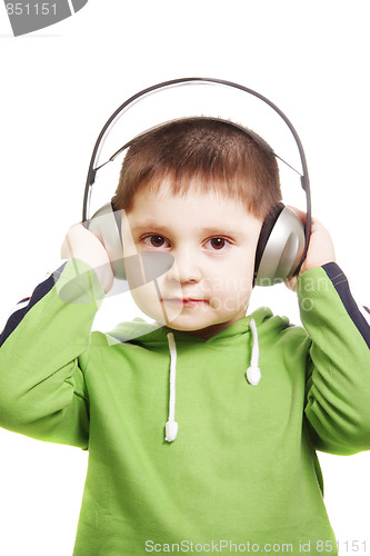 Image of Serious kid with headphones