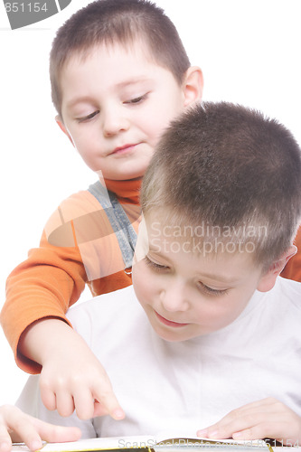 Image of Brothers reading book