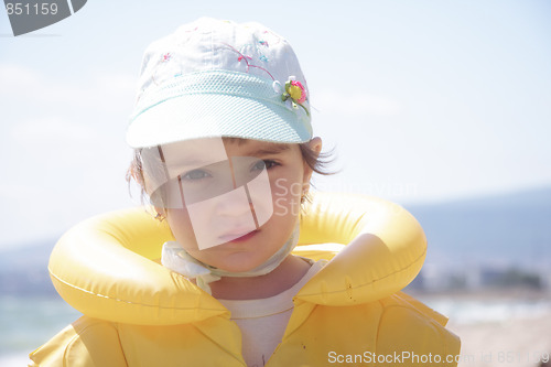 Image of Girl in yellow life jacket