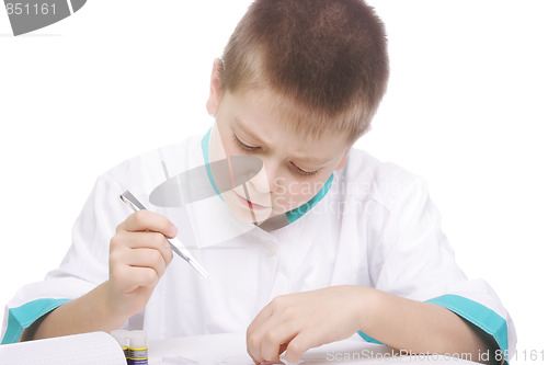 Image of Boy working with tweezers