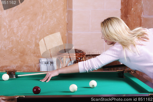 Image of Blonde playing pool