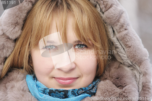 Image of Blond woman in frosty day