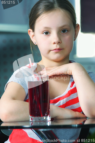 Image of Little girl with juice