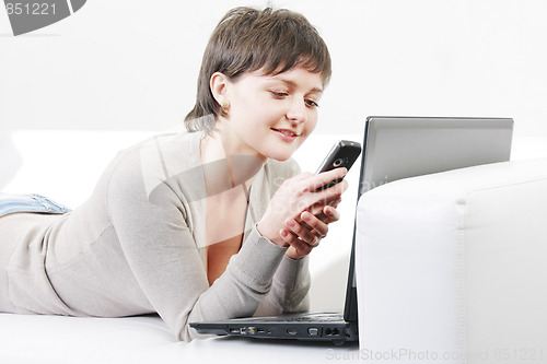 Image of Woman reading message