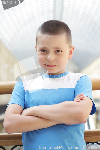 Image of Cute boy arms folded