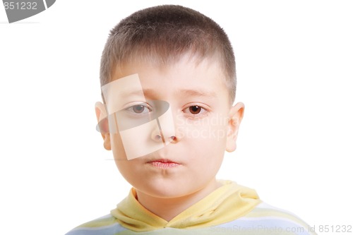 Image of Boy pursing lips