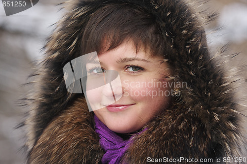 Image of Smiling woman in frosty day