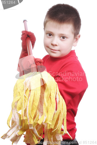 Image of Boy in red holding swab