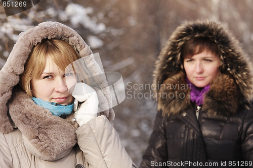 Image of Blonde on phone in sunny frosty day