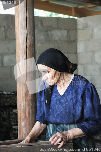 Image of Senior woman at work