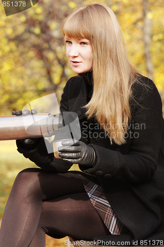 Image of Woman going fill cup