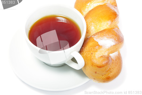 Image of Bun at tea cup