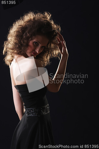 Image of Woman with fluffy hairdress