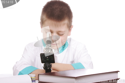 Image of Boy looking into microscope