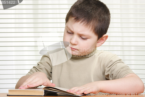 Image of Boy reading book