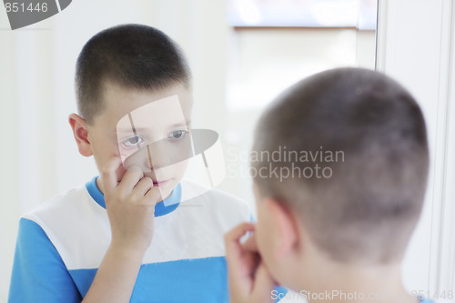 Image of Boy at mirror