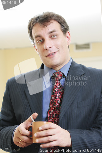 Image of Businessman with cup