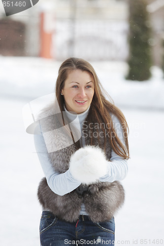Image of Smiling woman in winter day